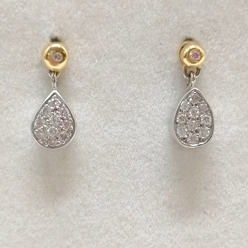 641 - Pair of 18ct white and yellow gold hallmarked diamond set earrings as teardrops, set with total of 2... 