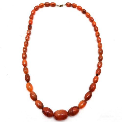 683 - Vintage strand of amber coloured bead necklace 74cm