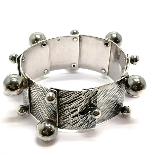 697 - 1970 silver brutalist style panel bangle with ball detail by Anthony Paton Hawksley (1921-91) - 69g