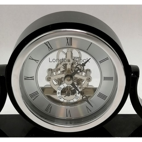 1120 - London Clock Co black glass mantle clock with quartz skeletal movement - 30cm x 12cm high