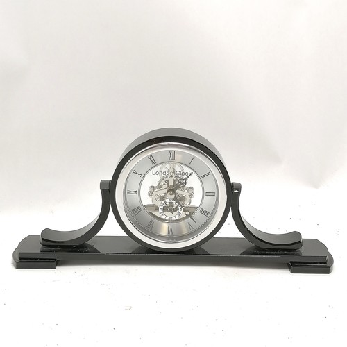 1120 - London Clock Co black glass mantle clock with quartz skeletal movement - 30cm x 12cm high