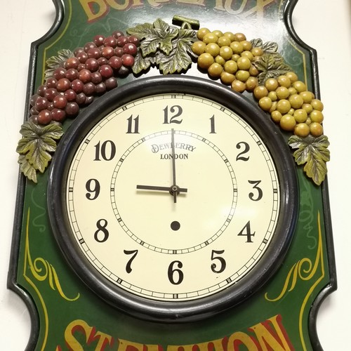 1122 - Unusual Dewberry (London) quartz wall clock with Bordeaux St Emilion decoration with an iron work fr... 