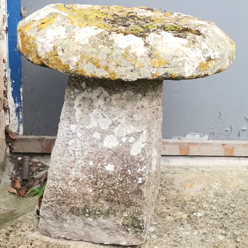 50 - Carved stone saddle stone 50cm high x 55cm diameter