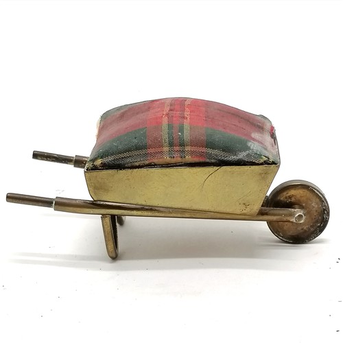 155 - Antique brass Scottish pin cushion in the form of a wheelbarrow with tartan cushion 11cm long x 4cm ... 