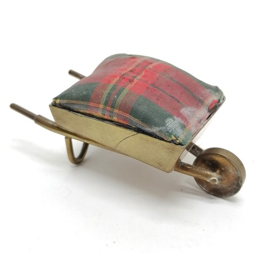 155 - Antique brass Scottish pin cushion in the form of a wheelbarrow with tartan cushion 11cm long x 4cm ... 