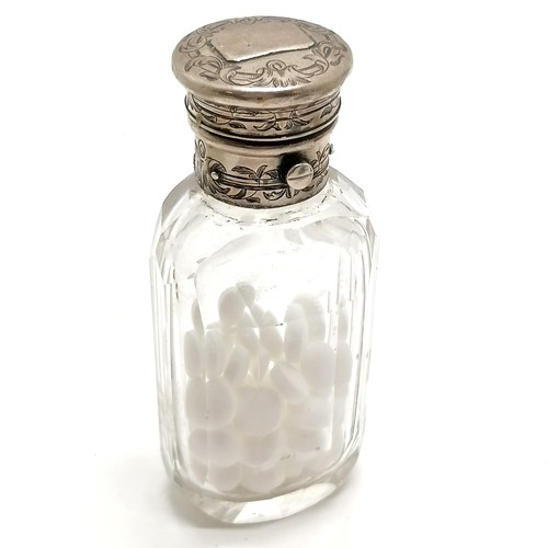 163 - Antique unmarked silver topped pill bottle 10cm high T/W a silver hallmarked topped jar A/F