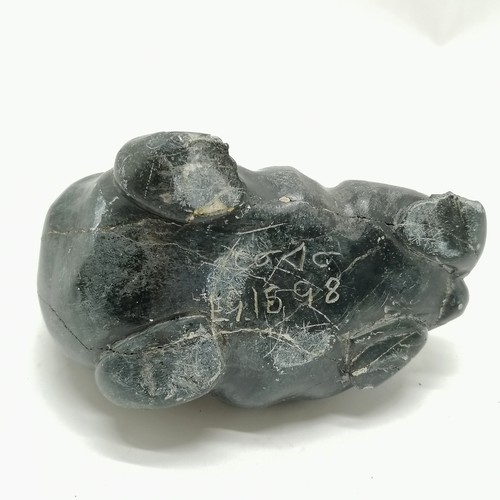 164 - 2 Inuit stone carvings of a seal and a walrus both 13cm long with signature and numbers to the bases