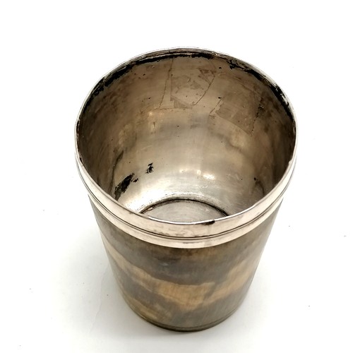 172 - Antique horn beaker with silver plated lining and rim with initials W B 9.5cm high