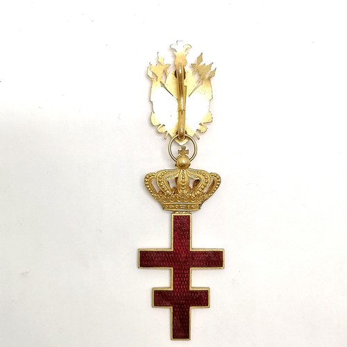 184 - Antique gilt metal and red enamel cross with suspender set with a red and white shield and black Mal... 