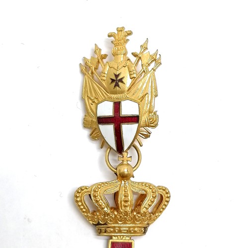 184 - Antique gilt metal and red enamel cross with suspender set with a red and white shield and black Mal... 