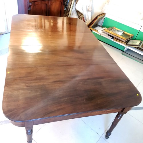 271 - An antique Mahogany D end extending Dining Table with 2 extending leaves, on turned column legs. 212... 