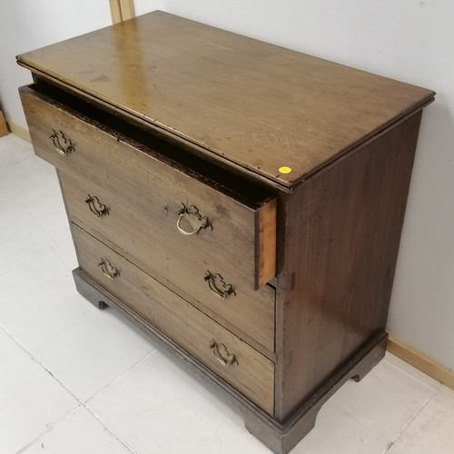 276 - An Antique pitch pine chest of 3 long drawers on shaped bracket feet. 82 cm in width, 74 cm in heigh... 