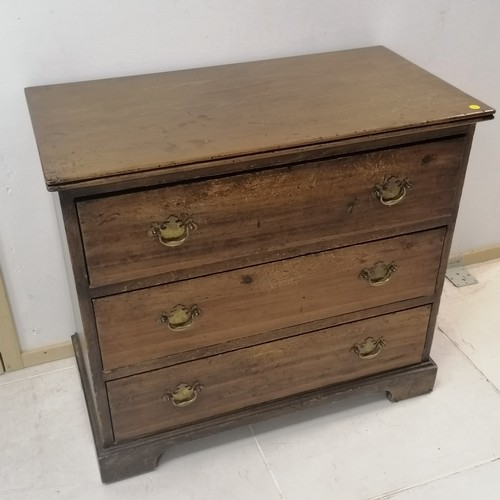 276 - An Antique pitch pine chest of 3 long drawers on shaped bracket feet. 82 cm in width, 74 cm in heigh... 