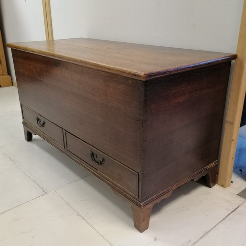 279 - An Antique oak Mule chest, interior fitted with candle box, on bracket shape feet, 109 cm in width, ... 