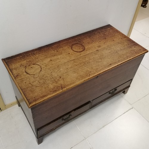 279 - An Antique oak Mule chest, interior fitted with candle box, on bracket shape feet, 109 cm in width, ... 