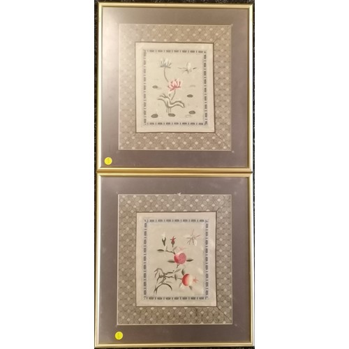 348 - Pair of Oriental framed embroidered panels on silk, frame 35 cm square.