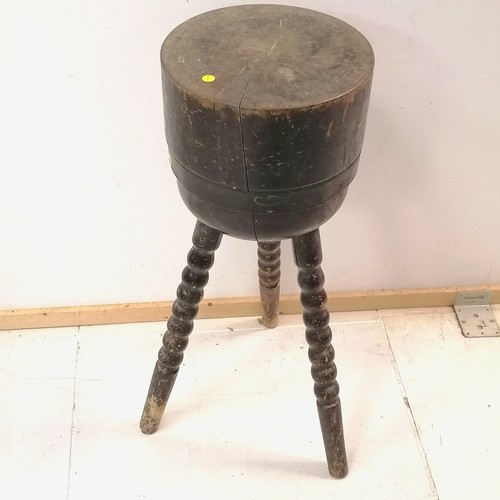 389 - Antique circular chopping block on 3 bobbin turned legs - 73cm high ~ some signs of worm to legs