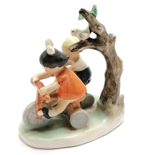 403 - Goebel figure of 2 children riding tricycles GF102 - 11cm high with no obvious damage