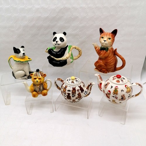 407 - Tony Wood Cat teapot, Circus dog teapot, Panda, and bear, t/w Cardew Bear teapot and another.