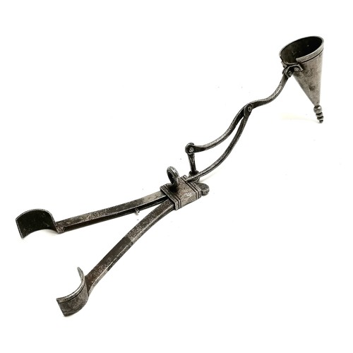 428 - Antique steel combination candle snuffer/prick with a grip mechanism total length 22cm