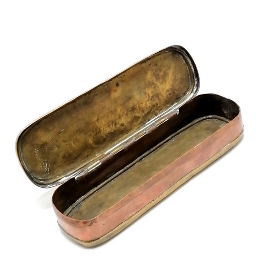 431 - Antique brass and copper tobacco box with rolled decorated lid and base 18cm x 5cm x 3cm high - has ... 