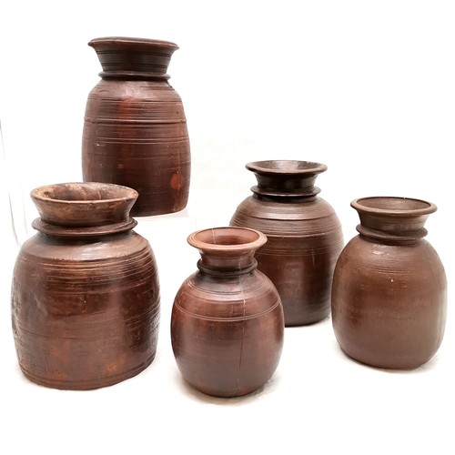 475 - Collection of 5 Indian wooden jars, all with turned decoration, varying sizes, highest 34 cm, 2 A/F.