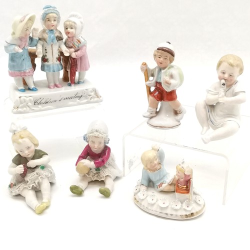 517 - Victorian fairing, Children's meeting 10cm high x 9 cm wide, t/w pair of German child figures with n... 