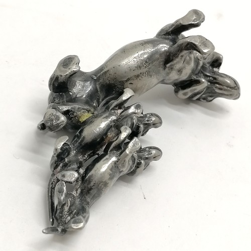 535 - 1  silvered metal dachshund knife rest (8.5cm) t/w group of 3 soft metal sausage dog figurine (has g... 