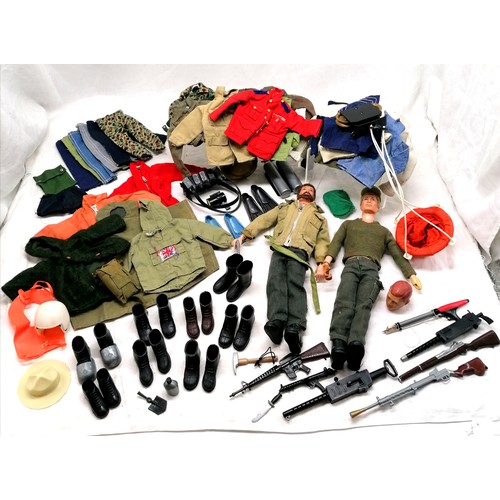 43 - 2 x vintage action man figures t/w large qty of boots / clothing / weapons etc inc non flock hair he... 