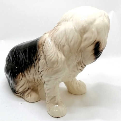 42 - Large ceramic figure of an old english sheepdog - 34cm high x 44cm long with no obvious damage