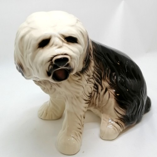 42 - Large ceramic figure of an old english sheepdog - 34cm high x 44cm long with no obvious damage