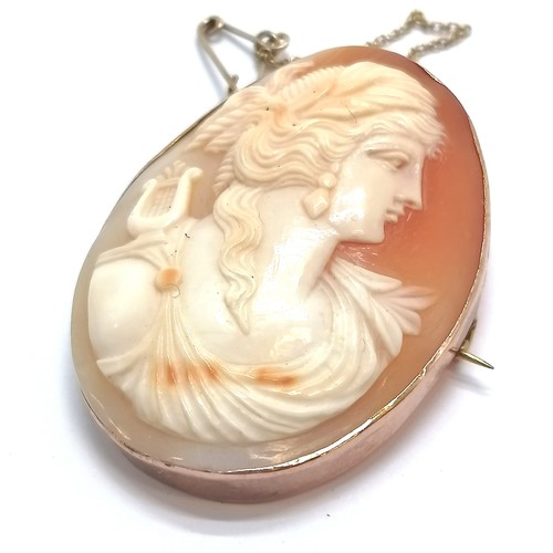 643 - Antique 9ct marked brooch hand carved cameo portrait in a classical style - 4.5cm drop & 12.8 g tota... 