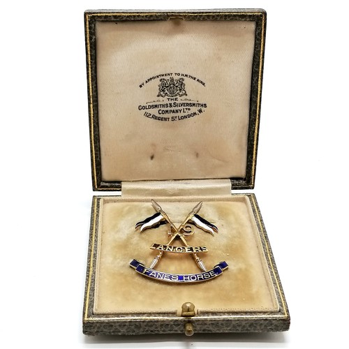 656 - Unmarked gold (touch tests as 18ct) antique 19th Lancers sweetheart brooch with blue & white enamel ... 
