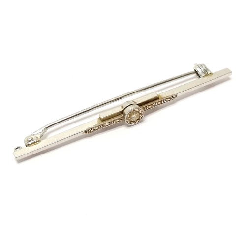 587 - Art Deco 9ct white gold and platinum marked diamond set bar brooch by P.P. Ltd 5.5cm long 3.1g total... 