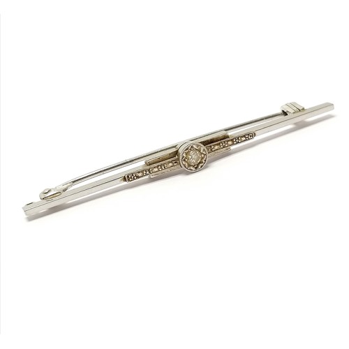 587 - Art Deco 9ct white gold and platinum marked diamond set bar brooch by P.P. Ltd 5.5cm long 3.1g total... 