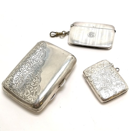 832 - Sterling silver engraved cigarette case & 2 vestas ~ total weight 149g - all have slight dents & sma... 