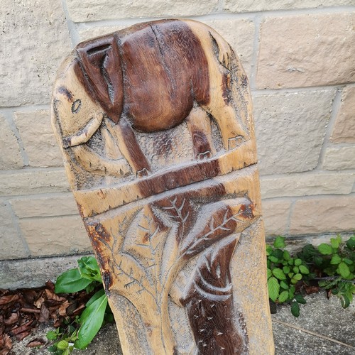 20 - Carved African high back chair decorated with assorted animals 90 cm high x 21 cm seat t/w similar 9... 