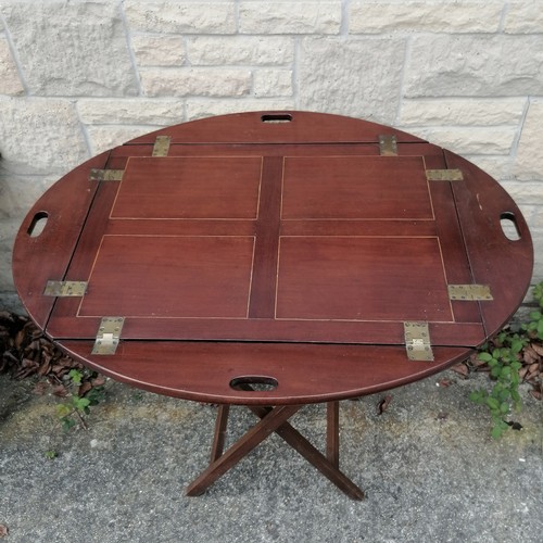 34 - Antique mahogany butlers tray on stand 73cm x 55cm with the sides folded up- has a repair to the woo... 