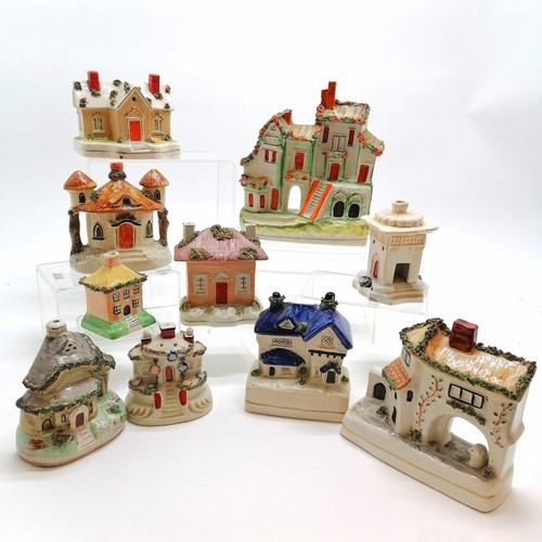 60 - Qty of Staffordshire pottery houses inc moneyboxes, pastille burners etc - tallest 21cm high & some ... 