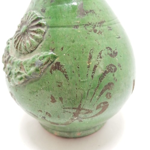 368 - Continental green glazed ewer with twisted handle and paint decoration 36cm high - some losses to th... 