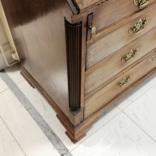 51 - Georgian walnut bureau on ogee bracket feet with fitted interior with leather book detailing to the ... 