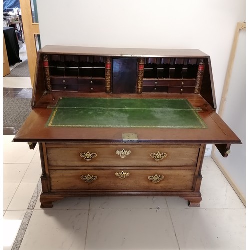 51 - Georgian walnut bureau on ogee bracket feet with fitted interior with leather book detailing to the ... 