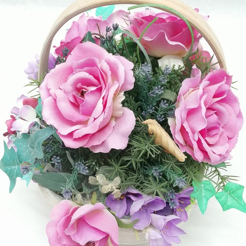 55 - basket with artificial flowers