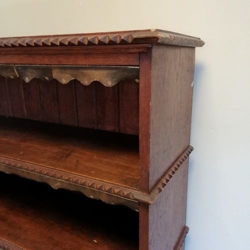 70 - Antique oak shelf unit with scalloped leather shelf decoration and raised carved detailing to shelf ... 