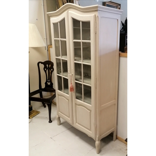 71 - Painted 2 door glazed display cabinet with shelved interior and original key - 183cm high x 103cm wi... 