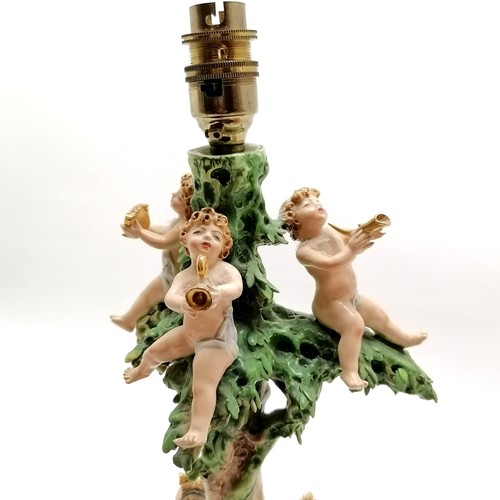 81 - Capodimonte lamp base decorated with putti playing musical instruments, base 41cm high + shade - som... 