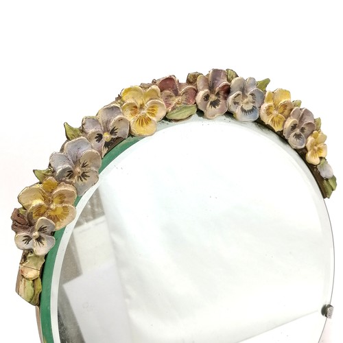 90 - Antique circular Barbola mirror with carved and hand painted Pansy decoration 29cm high x 25cm diame... 