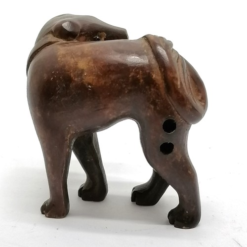 100 - Carved wooden dog netsuke with bead eyes 3.5cm high- no obvious damage