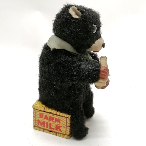 105 - Vintage Toy Nomura wind up Hungry Cub 15cm high with original box - in good condition apart from som... 