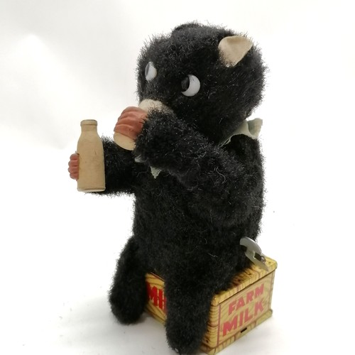 105 - Vintage Toy Nomura wind up Hungry Cub 15cm high with original box - in good condition apart from som... 